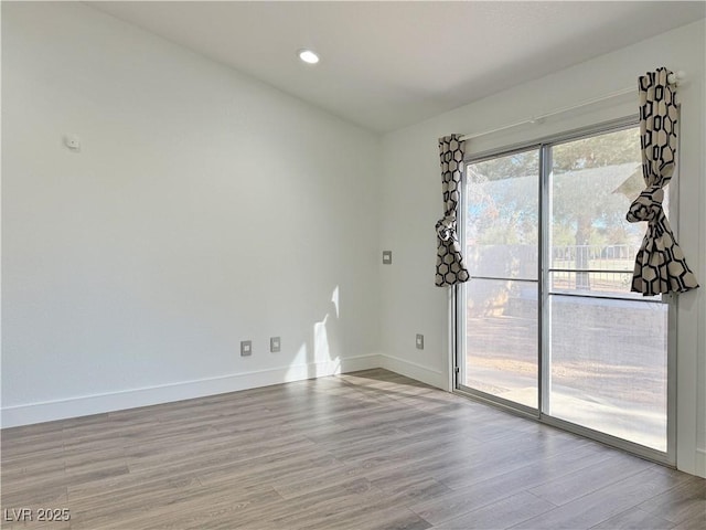 empty room featuring light hardwood / wood-style flooring