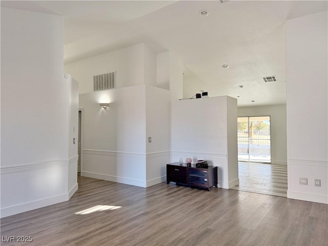 empty room featuring wood-type flooring