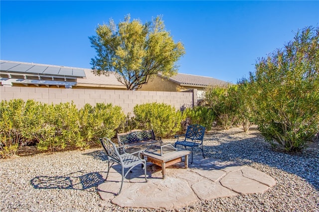 view of patio with an outdoor fire pit