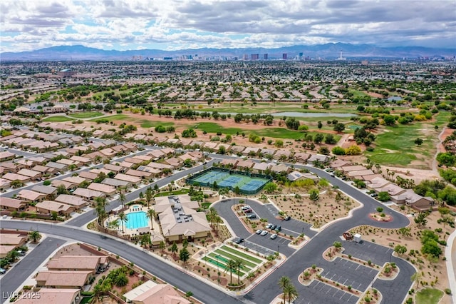 birds eye view of property featuring a mountain view