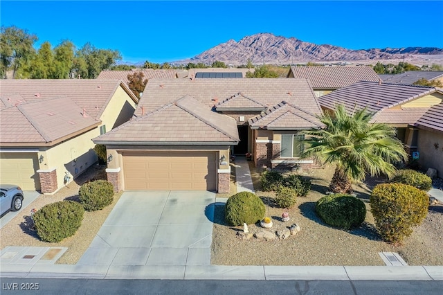 ranch-style home featuring a mountain view