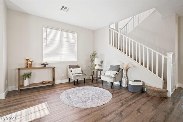 sitting room with hardwood / wood-style floors