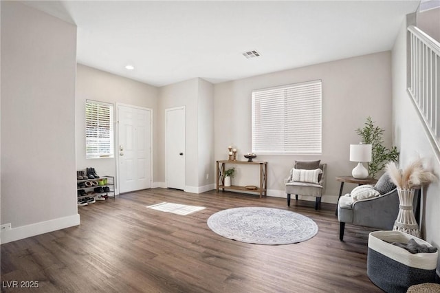 sitting room featuring dark hardwood / wood-style floors