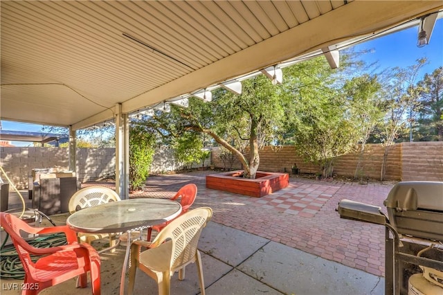 view of patio / terrace featuring a grill