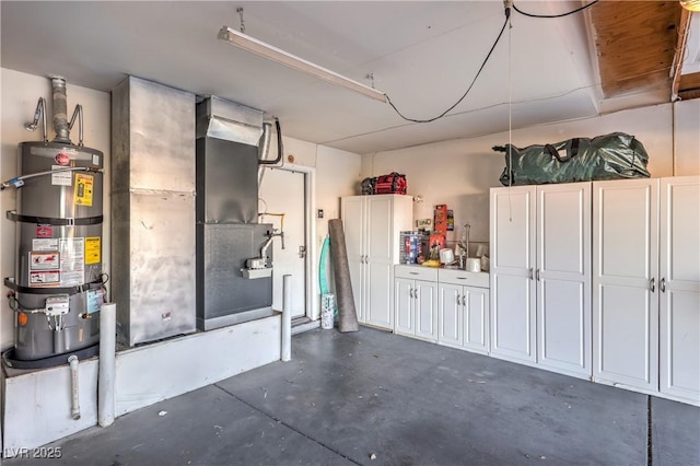 garage featuring strapped water heater