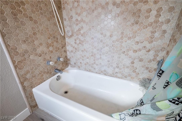 bathroom featuring tub / shower combination