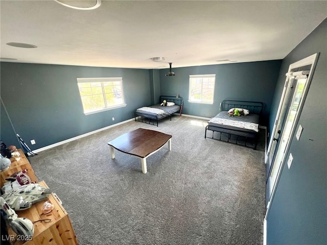 unfurnished bedroom featuring dark carpet