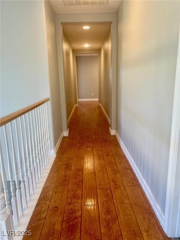 corridor featuring hardwood / wood-style flooring