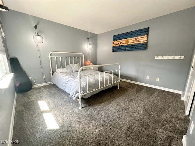 bedroom featuring dark colored carpet