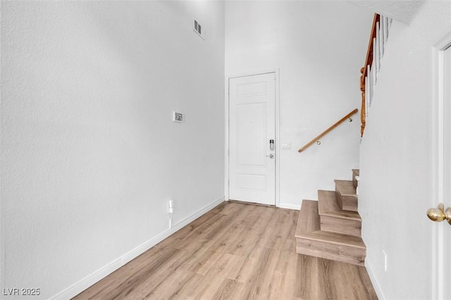 entrance foyer with light wood-type flooring