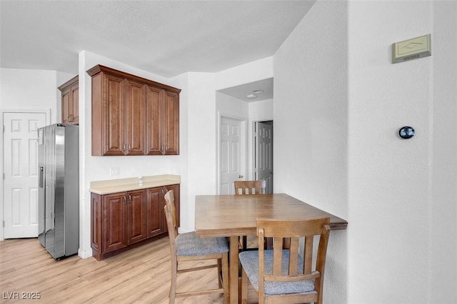 dining area featuring light hardwood / wood-style floors