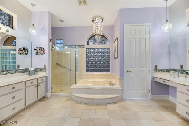 bathroom featuring vanity, a notable chandelier, tile patterned floors, and separate shower and tub