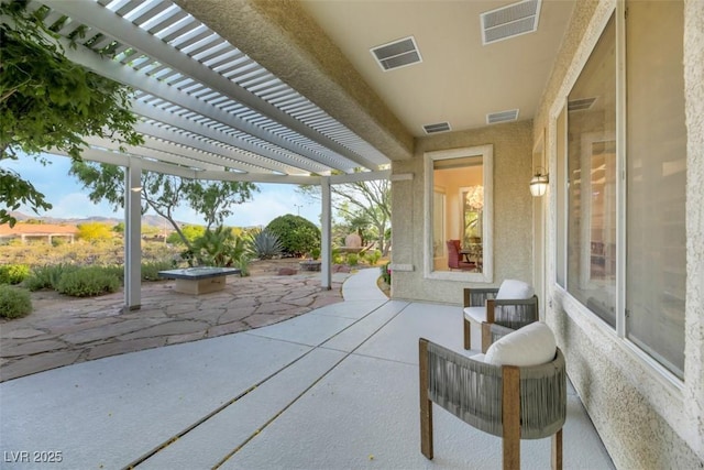 view of patio / terrace with a pergola