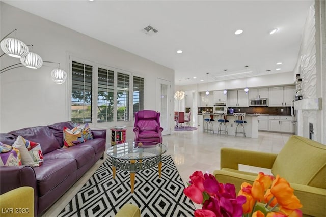 living room featuring light tile patterned flooring