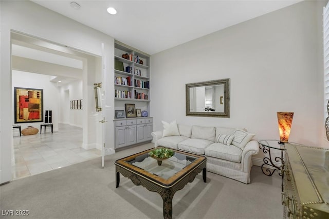 living room with light colored carpet