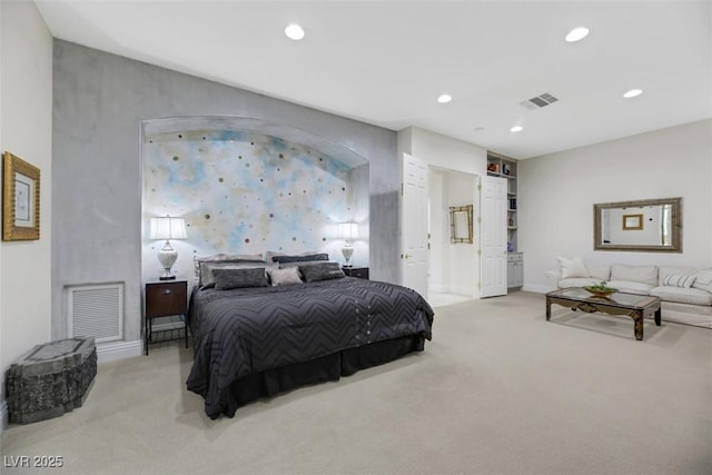 bedroom featuring light carpet