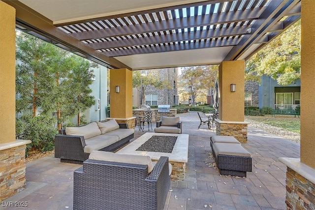 view of patio / terrace with an outdoor living space, a pergola, and area for grilling