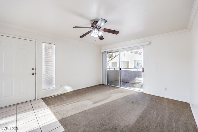 unfurnished bedroom with access to exterior, ceiling fan, ornamental molding, and light colored carpet