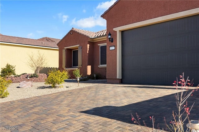 entrance to property with a garage