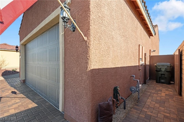 view of home's exterior featuring a garage