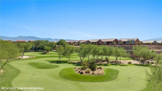 surrounding community featuring a mountain view