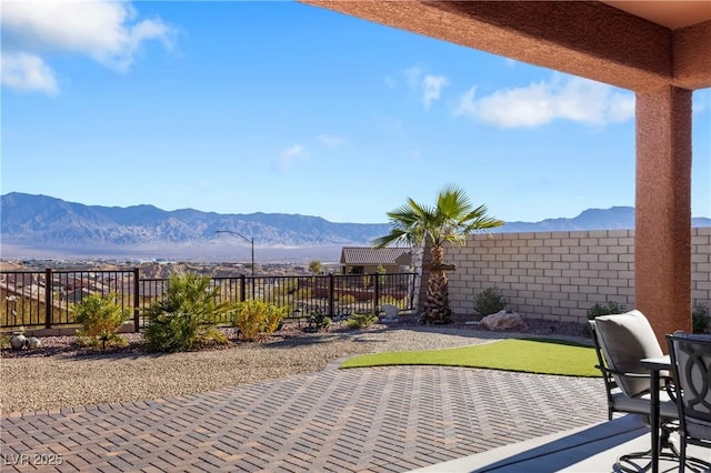 view of patio with a mountain view