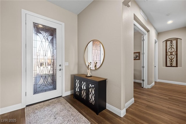 foyer featuring dark hardwood / wood-style floors