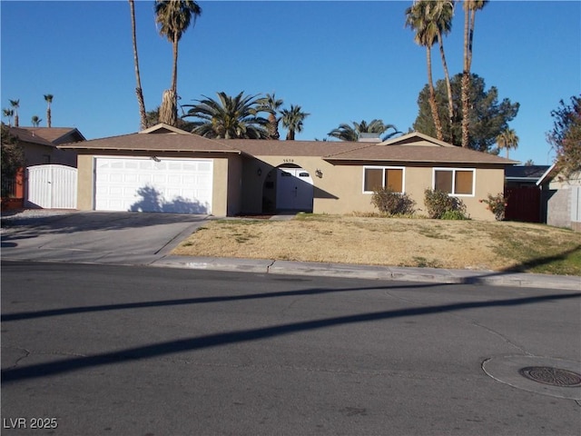 single story home featuring a garage