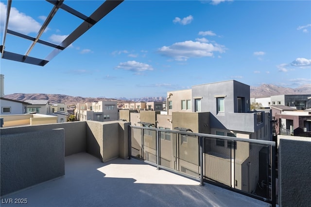 balcony featuring a mountain view