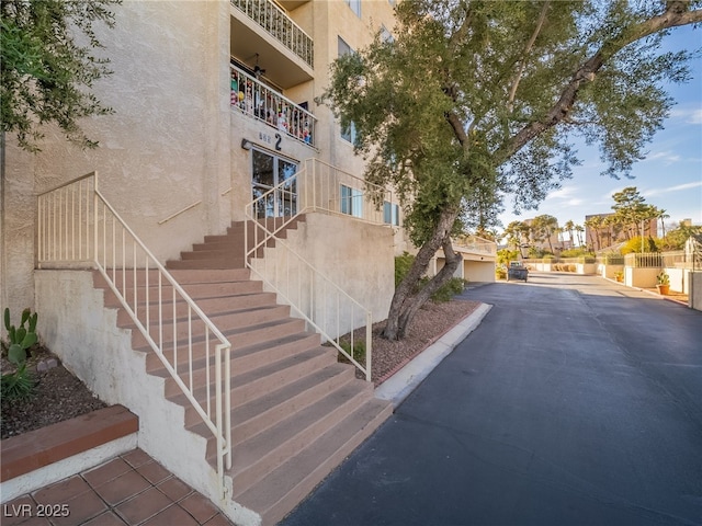 view of property with stairway