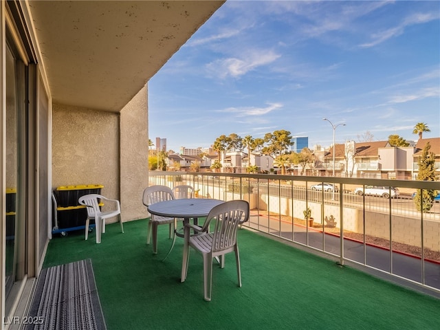 balcony featuring a residential view