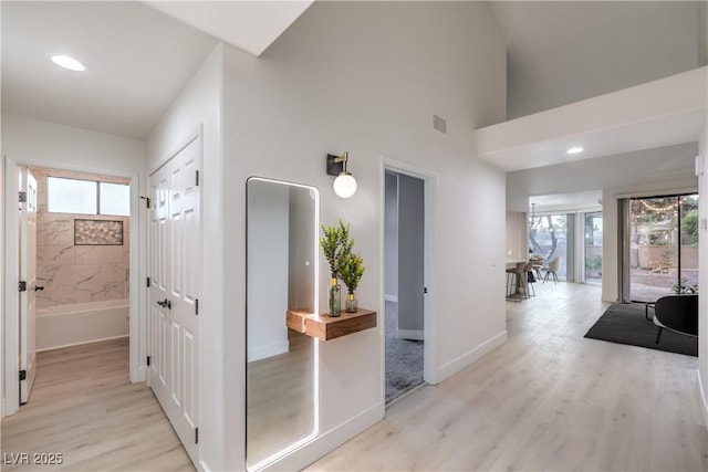 hall featuring light wood-type flooring