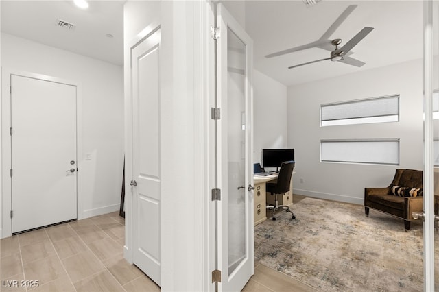 office featuring ceiling fan