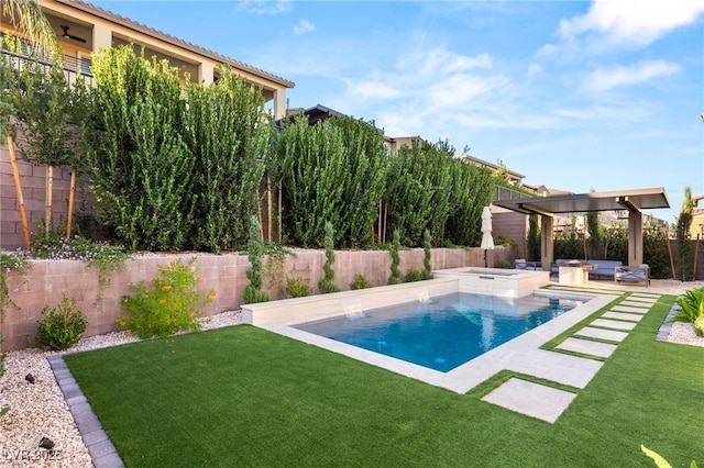 view of pool featuring an in ground hot tub, a yard, and a patio area