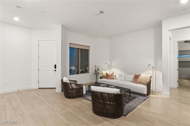 living room with light hardwood / wood-style floors