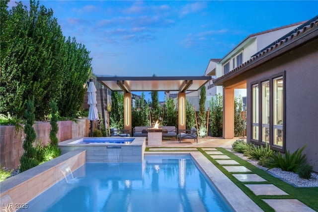 view of swimming pool with an in ground hot tub, an outdoor hangout area, and a patio