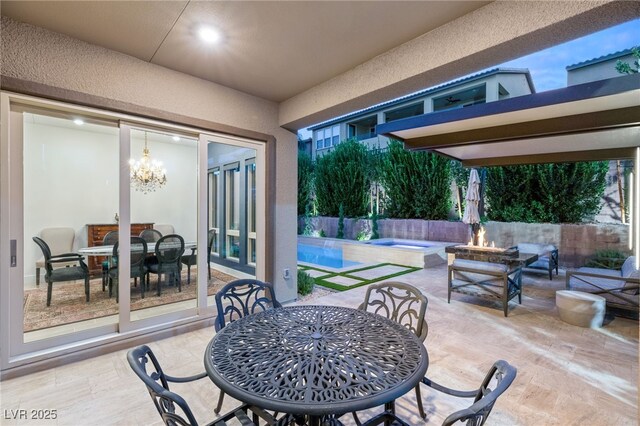 view of patio / terrace with a fenced in pool