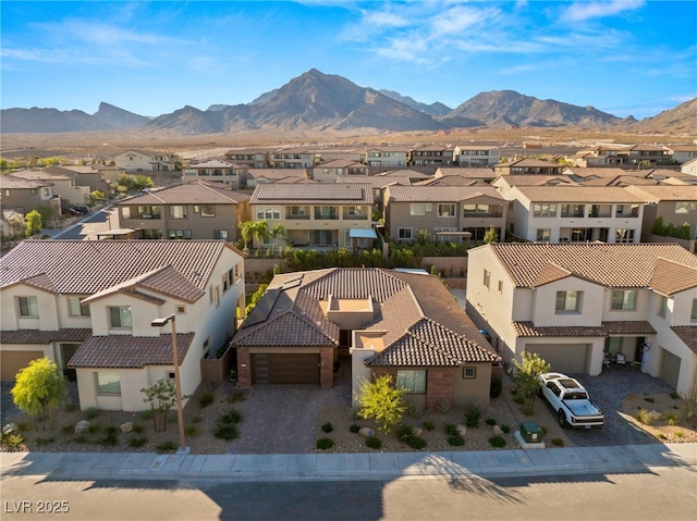 drone / aerial view featuring a mountain view