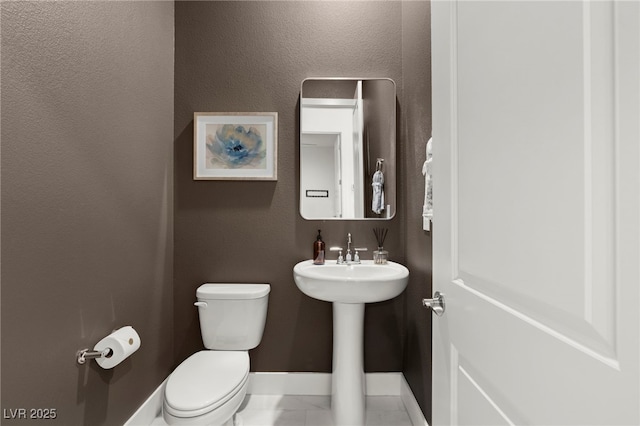 bathroom featuring toilet