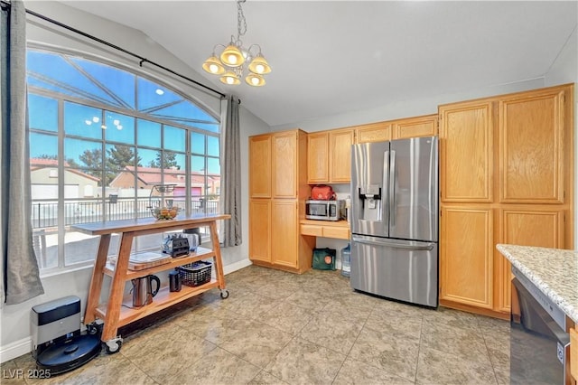 kitchen with vaulted ceiling, light brown cabinets, appliances with stainless steel finishes, pendant lighting, and light stone countertops