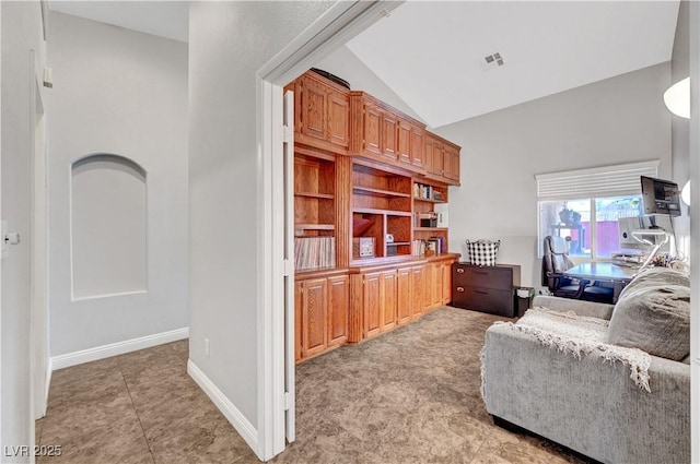 tiled living room with vaulted ceiling