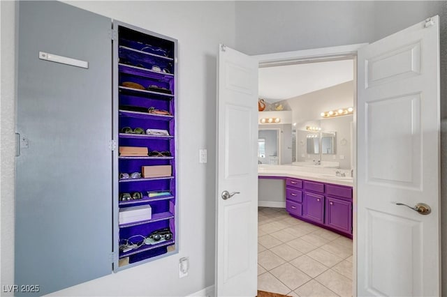 bathroom with vanity and tile patterned floors