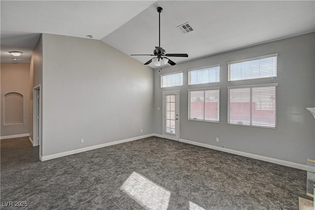 unfurnished room with vaulted ceiling and ceiling fan