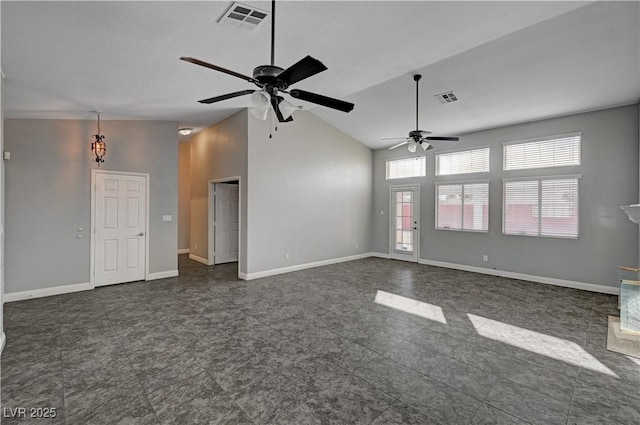 unfurnished living room featuring lofted ceiling and ceiling fan