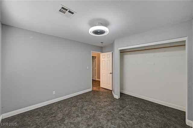 unfurnished bedroom featuring a closet