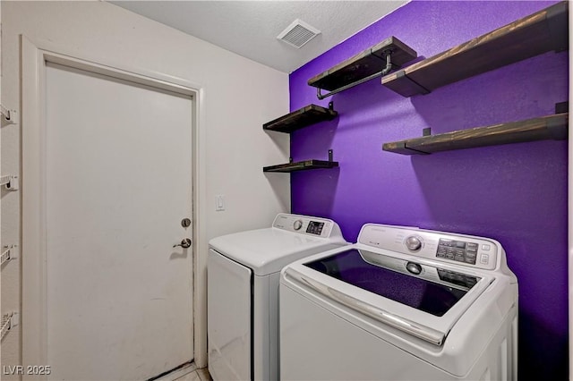 laundry area featuring washer and dryer