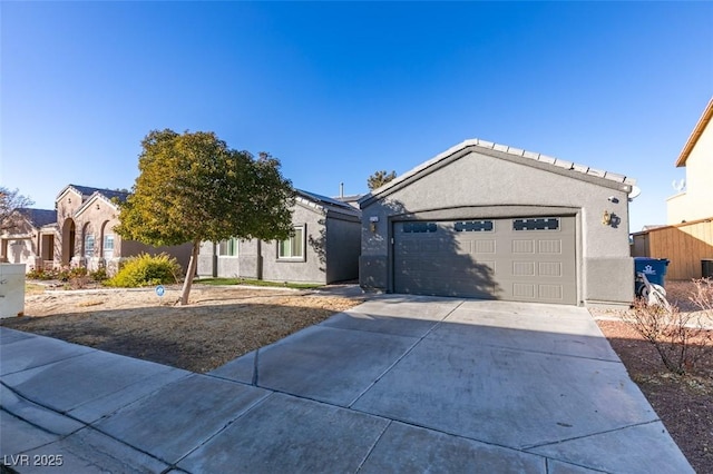 single story home with a garage