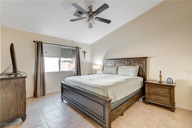 bedroom with ceiling fan, light tile patterned flooring, and lofted ceiling