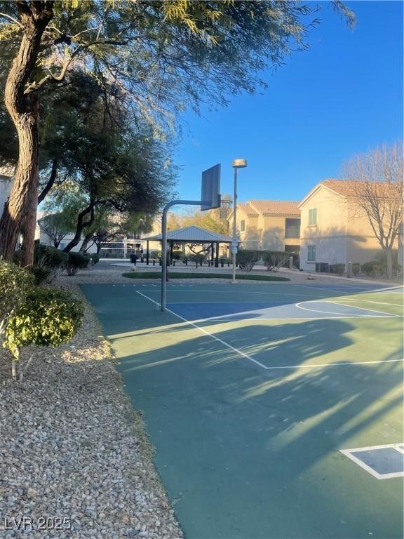 exterior space featuring a gazebo and basketball court