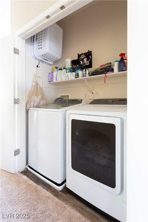 laundry area featuring washing machine and dryer and laundry area